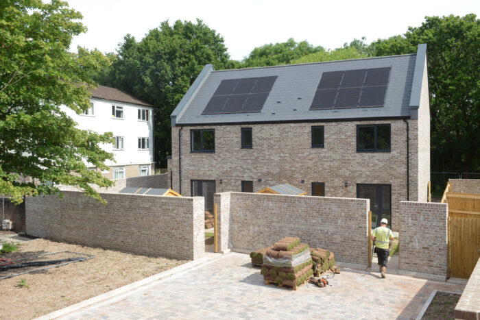 One Planet Cardiff New council housing Trenchard Drive Llanishen with Solar PV plus Air source Heat Pumps and electric car charging facilities